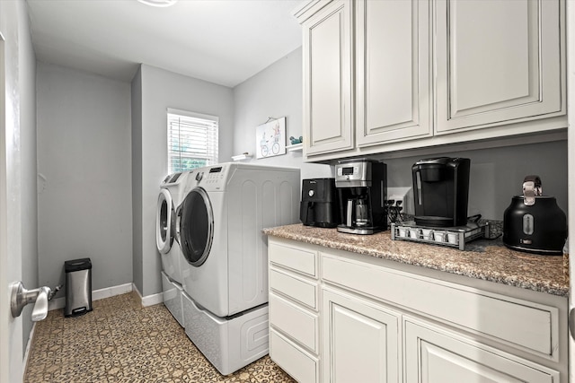 laundry area featuring washing machine and dryer