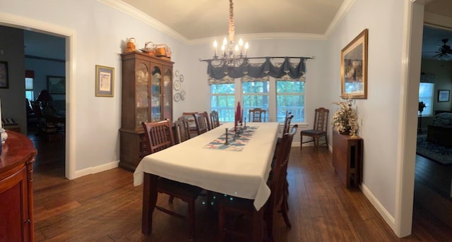 dining space featuring ornamental molding, ceiling fan with notable chandelier, and dark wood-type flooring