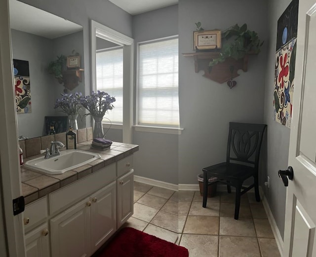 bathroom with vanity and tile patterned floors