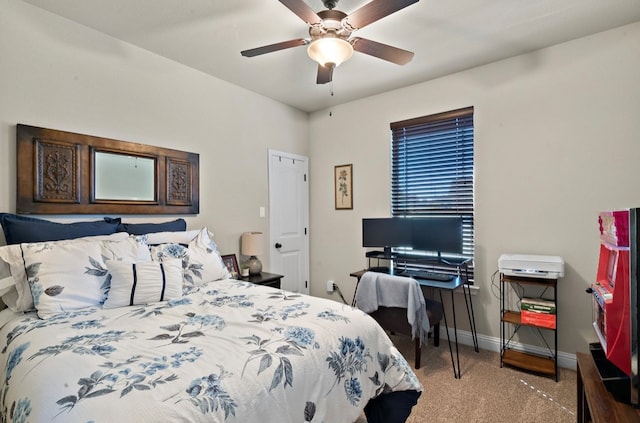 carpeted bedroom with ceiling fan