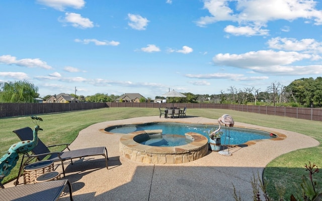 view of swimming pool featuring a yard, an in ground hot tub, and a patio