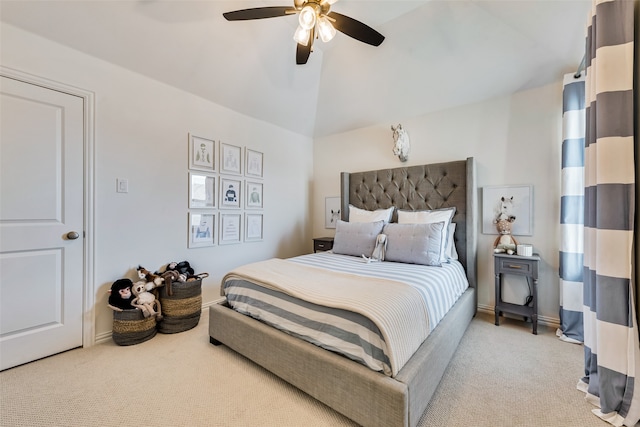 bedroom featuring ceiling fan, light carpet, and lofted ceiling