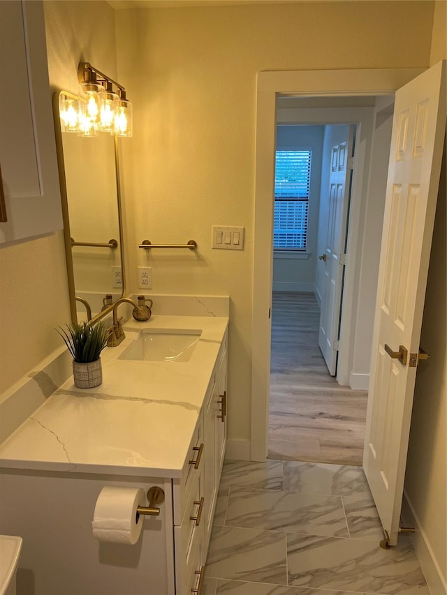 214 E 15th Ave, Corsicana, TX 75110 - bathroom with vanity and marble finish floors