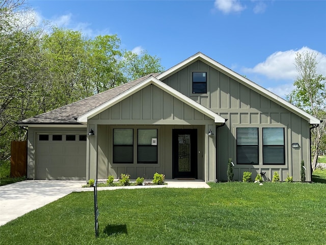 214 E 15th Ave, Corsicana, TX 75110 - view of front of property featuring board and batten siding, a garage, a shingled roof, a front lawn, and concrete driveway