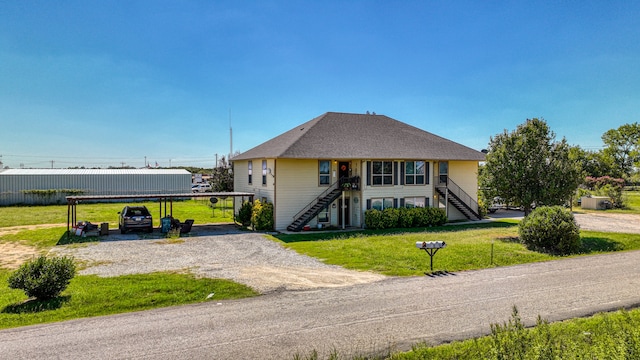 view of front of home featuring a front lawn