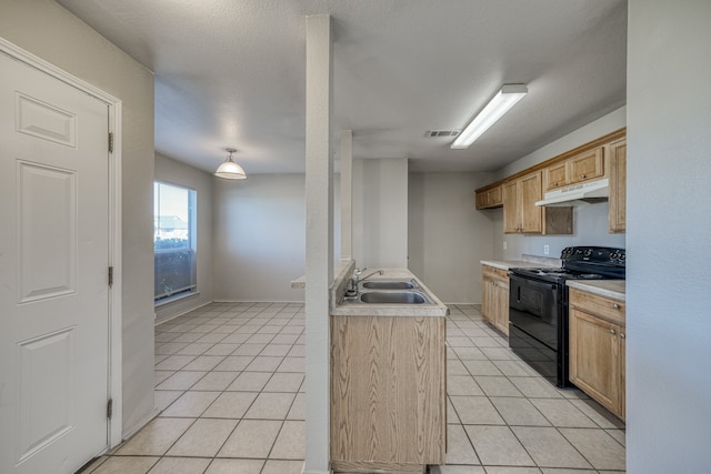 kitchen featuring a textured ceiling, light tile patterned flooring, sink, light brown cabinets, and black electric range oven