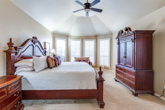 living room with a towering ceiling, light hardwood / wood-style floors, a healthy amount of sunlight, and sink