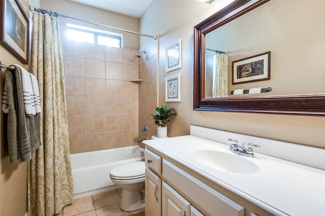 full bathroom with toilet, shower / bath combo, vanity, and tile patterned floors