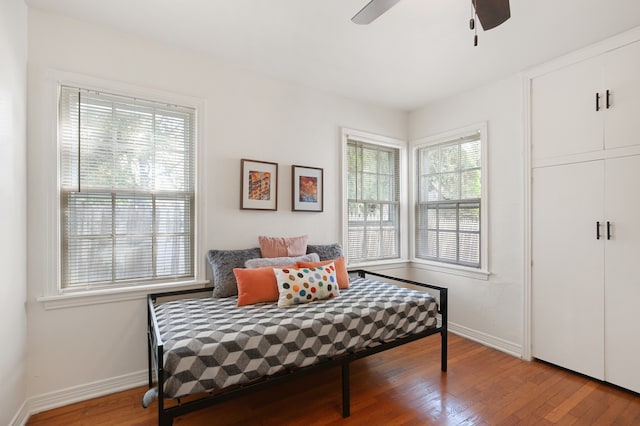 bedroom featuring wood-type flooring and ceiling fan