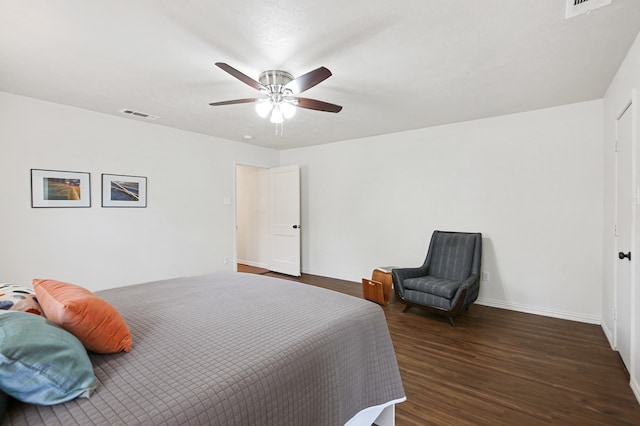 bedroom featuring ceiling fan and dark hardwood / wood-style floors