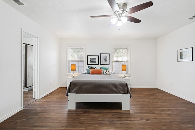 bedroom featuring dark wood-type flooring and ceiling fan