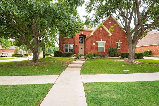 view of front facade with a front lawn