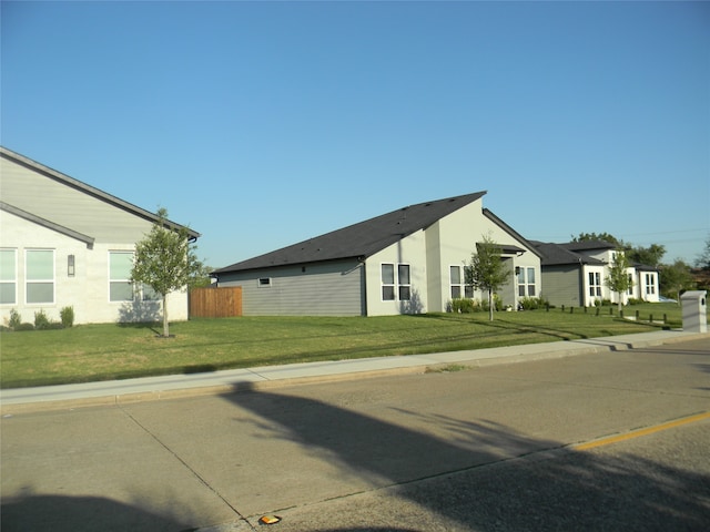 view of home's exterior featuring a yard