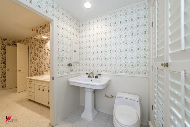 bathroom featuring toilet and tile patterned floors