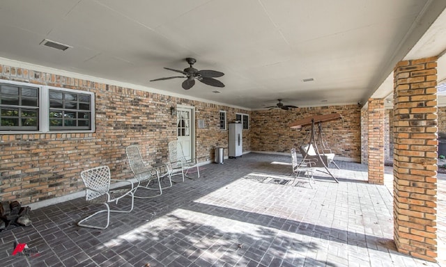 view of patio with ceiling fan