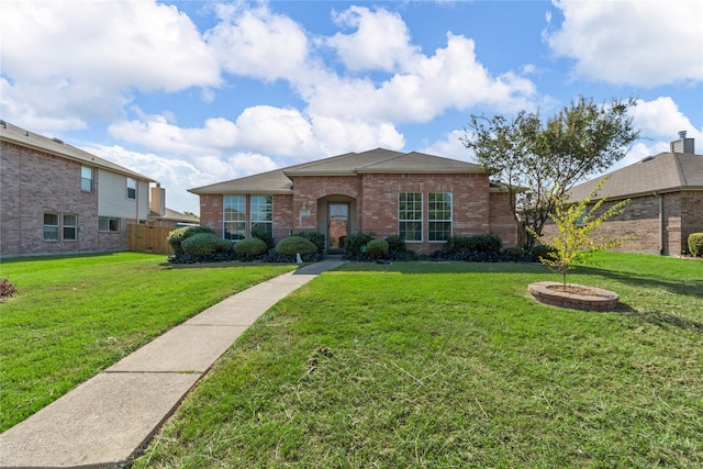 single story home with a front yard