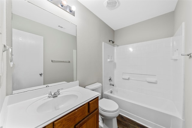 full bathroom featuring  shower combination, hardwood / wood-style floors, vanity, and toilet