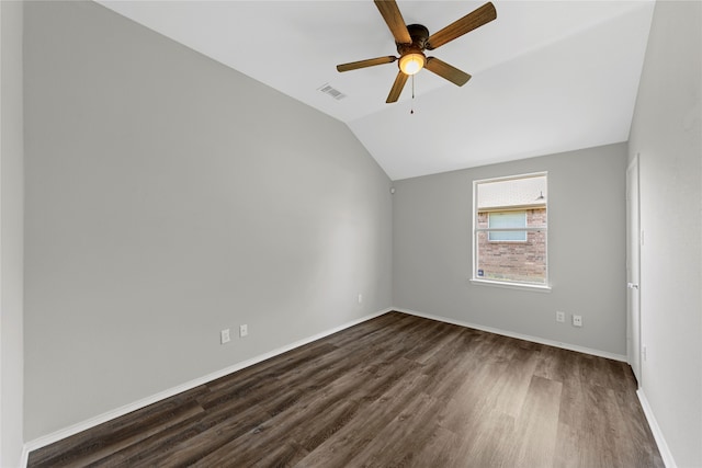 interior space featuring ceiling fan, lofted ceiling, and dark hardwood / wood-style floors