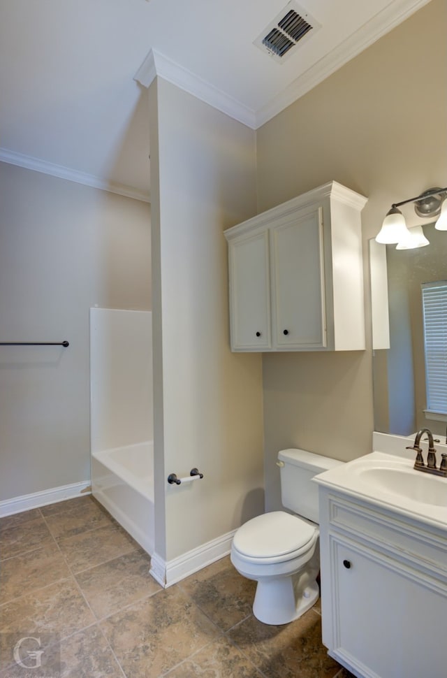 bathroom featuring vanity, a bathtub, crown molding, and toilet