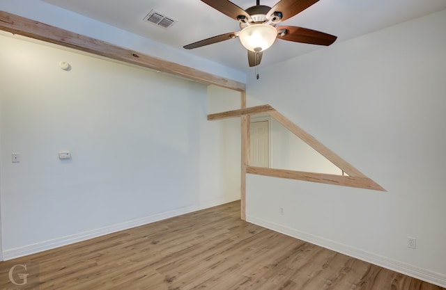 unfurnished room featuring light hardwood / wood-style floors and ceiling fan