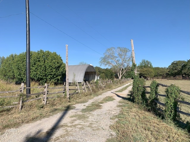 view of road with a rural view