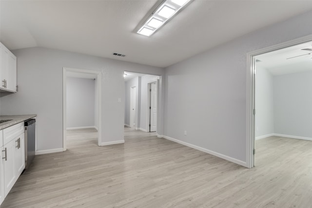 kitchen featuring dishwasher, light hardwood / wood-style floors, white cabinetry, and ceiling fan