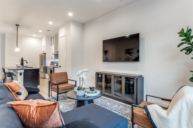 living room with light hardwood / wood-style floors