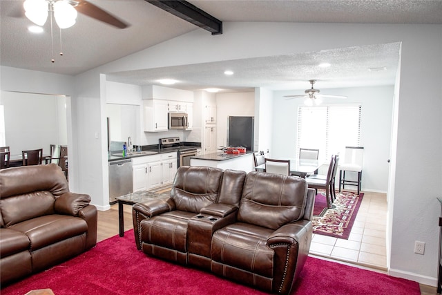 3604 Fort Hunt Dr, Arlington, TX 76016 - living room featuring ceiling fan, vaulted ceiling with beams, recessed lighting, and baseboards