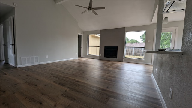 unfurnished living room featuring dark hardwood / wood-style floors, high vaulted ceiling, and ceiling fan