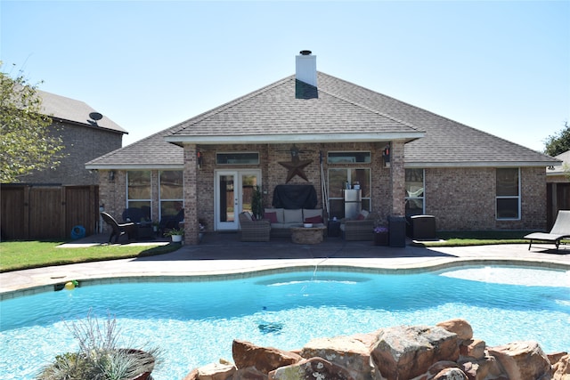 view of pool with an outdoor hangout area and a patio area