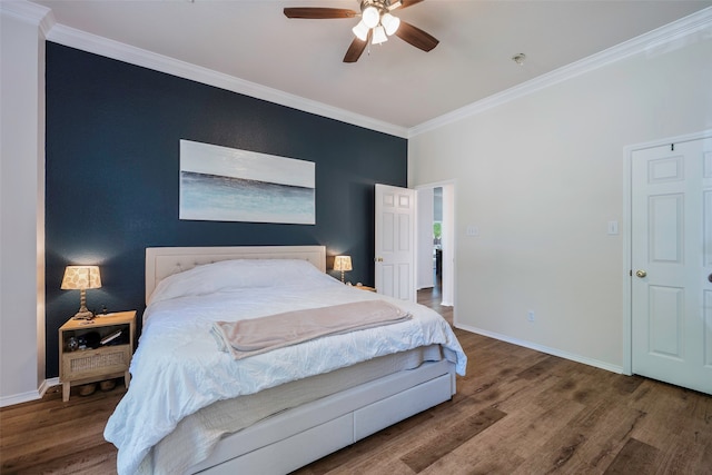 bedroom featuring ceiling fan, crown molding, and hardwood / wood-style flooring