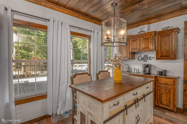 9321 Mccain Rd, Shreveport, LA 71107 - kitchen featuring an inviting chandelier, butcher block counters, decorative light fixtures, wood ceiling, and wood finished floors