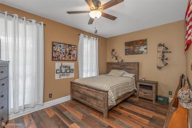 9321 Mccain Rd, Shreveport, LA 71107 - bedroom featuring ceiling fan, wood finished floors, and baseboards