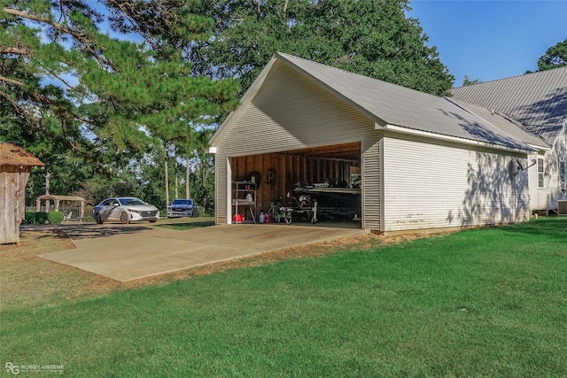 garage with a lawn