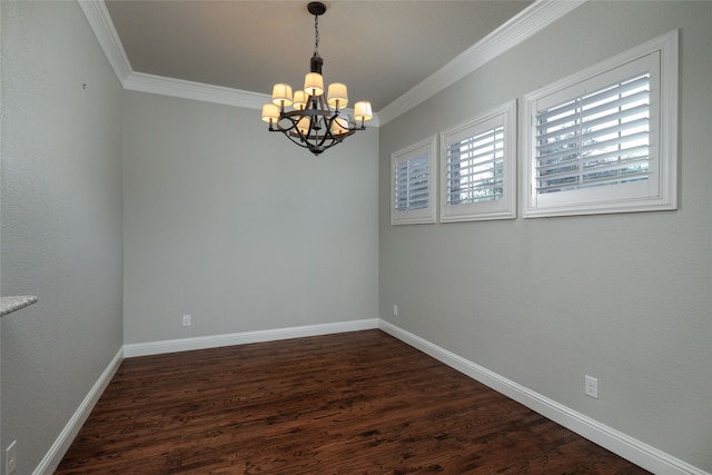 unfurnished room with crown molding, dark hardwood / wood-style floors, and a notable chandelier