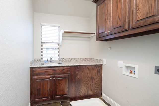 laundry room featuring washer hookup, cabinets, sink, and hookup for an electric dryer