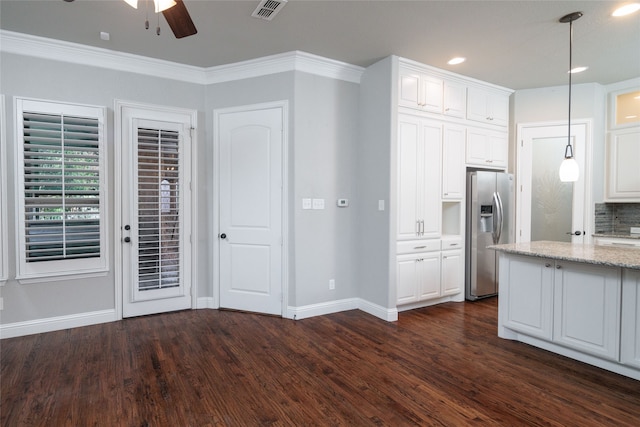 kitchen featuring ceiling fan, white cabinets, decorative light fixtures, stainless steel fridge with ice dispenser, and dark hardwood / wood-style floors