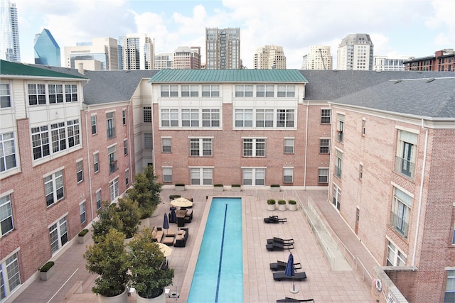 view of pool featuring a patio area