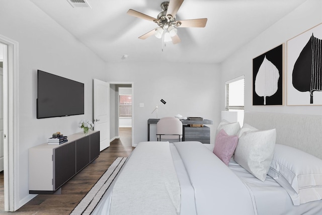 bedroom featuring ceiling fan and dark wood-type flooring