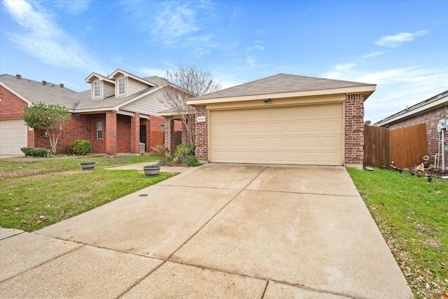 view of front of house with a front lawn and a garage