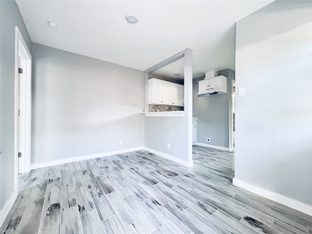 unfurnished room featuring light wood-type flooring