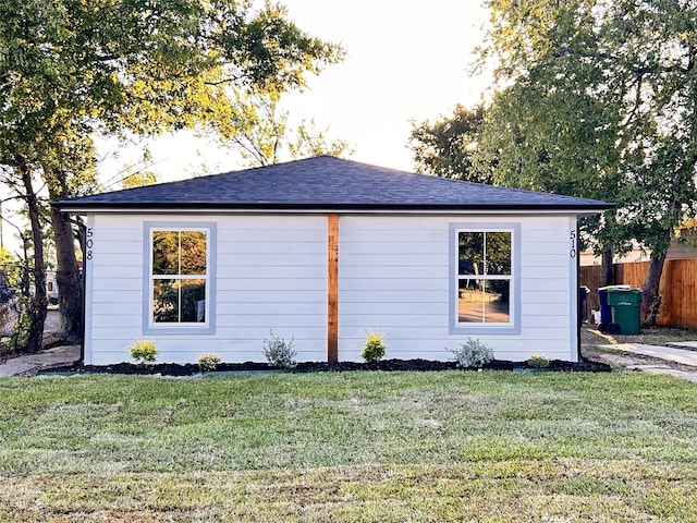 view of property exterior featuring a yard