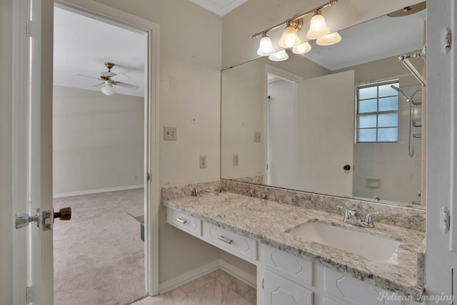 bathroom with ceiling fan, vanity, and tiled shower