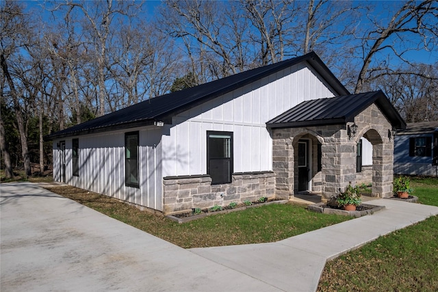 view of property exterior featuring a lawn