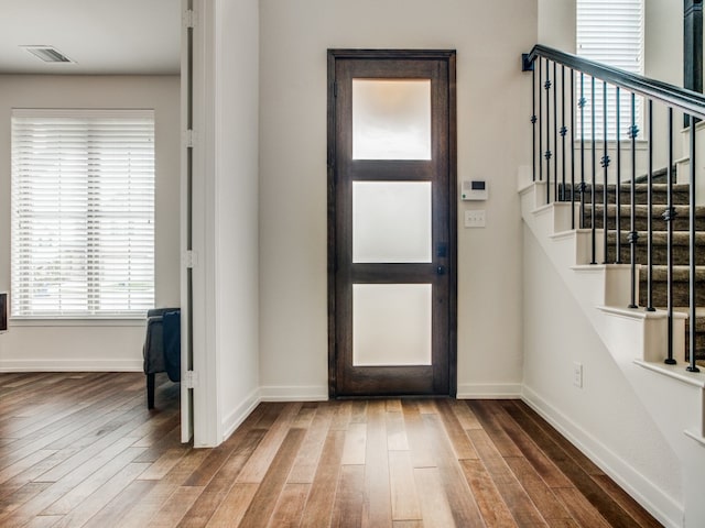 foyer with hardwood / wood-style flooring