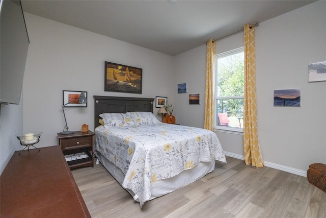 bedroom with light hardwood / wood-style flooring