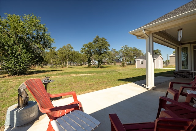 view of patio with a storage shed