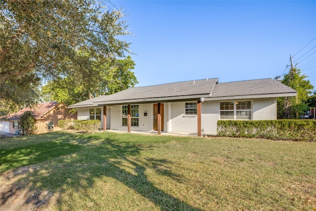 single story home with a front lawn