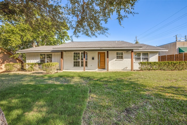 ranch-style house with a front yard