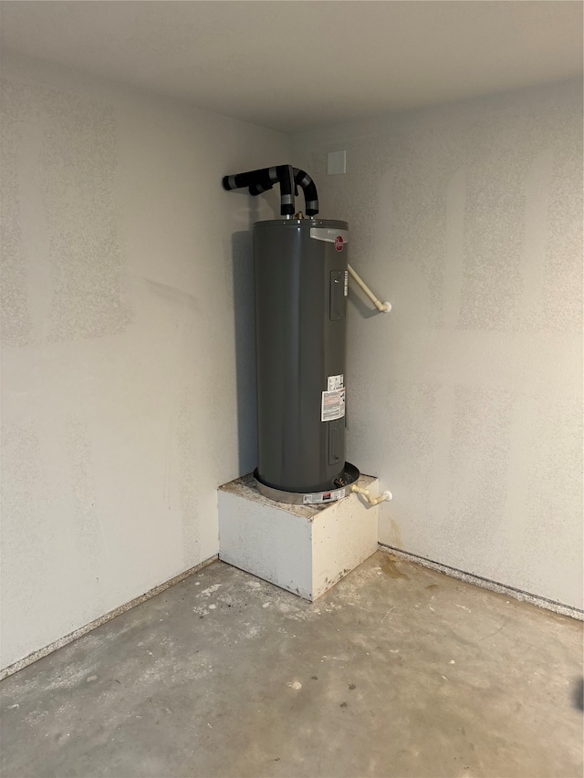 utility room featuring electric water heater